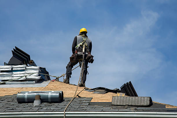 Professional Storm Damage Roof Repair technician working in New Durham, NH